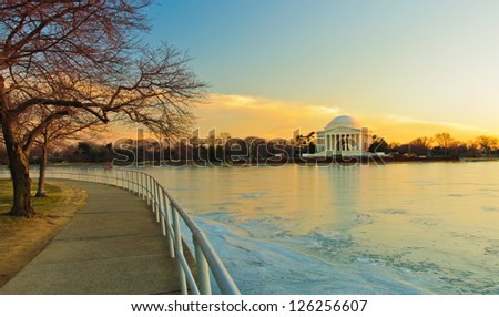Jefferson Memorial and a frozen Potomac at sunset. Washington, DC