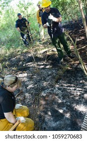 Jefferson, Oregon/ USA - 05-17-2009  Fire Fighters Working With The Investigator At The Fire