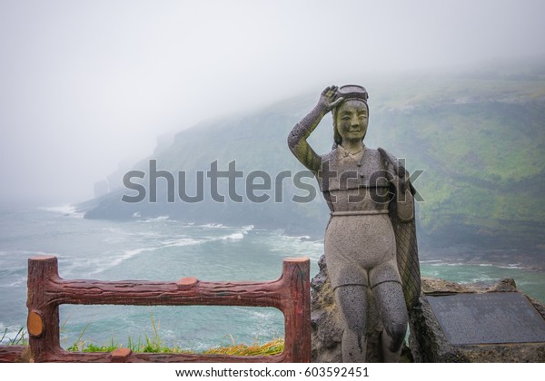 Jeju, South Korea - 27 September 2016:\
Haenyeo statue on Udo Island. Haenyeo are female divers in the\
Korean province of Jeju. Known for their independent spirit, iron\
will and determination.