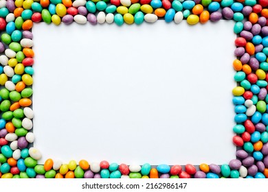 Jelly Bean Frame With Blank Paper Sheet, Copy Space