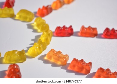 Jelly Bean.Confiture.Marmalade Bear.Sugar.Pleasure. Marmalade Bears On A White Background In The Shape Of A Sun