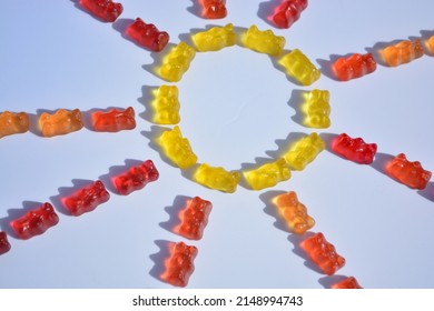 Jelly Bean.Confiture.Marmalade Bear.Sugar.Pleasure. Marmalade Bears On A White Background In The Shape Of A Sun