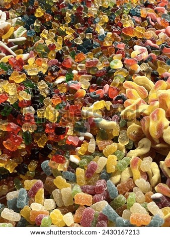 Jelly beans and gummy bears. Full of candies.