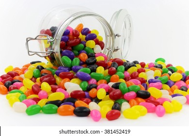 Jelly Beans spilt from Glass Jar with Open Lid and Metal Clasp II
