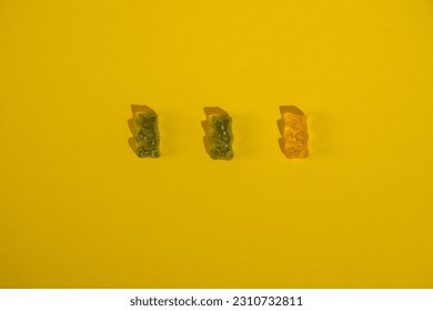 jelly bears candy isolated on a yellow background. Jelly Bean. - Shutterstock ID 2310732811