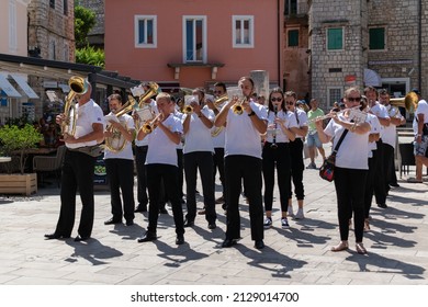 Jelsa, Croatia - August 05, 2021: Concert of the orchestra on the square of the Croatian National Revival in Jelsa on the island of Hvar in Croatia