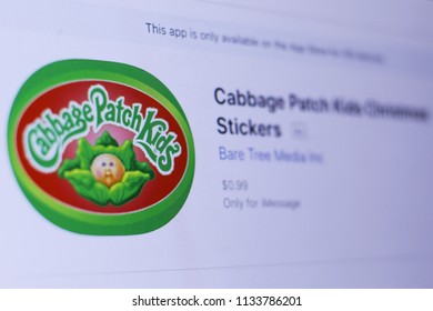 JEMBER, EAST JAVA, INDONESIA, JULY 14, 2018. Cabbage Patch Kids Christmas Stickers  App In Play Store. Close-up On The Laptop Screen.