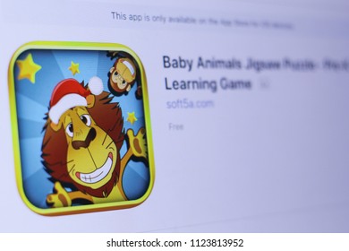 JEMBER, EAST JAVA, INDONESIA, JUNE 29, 2018. Baby Animals Jigsaw Puzzle - Pre-K Learning Game app in play store. close-up on the laptop screen.