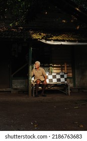 Jepara, Indonesia, August 03 2022 Old Man Sunbathing In The Afternoon