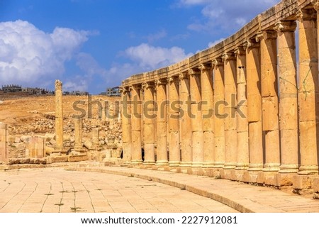 Jerash, Jordan. Square with row of Corinthian columns of Oval Forum Plaza at archaeological site, ruins of Greek and Roman period