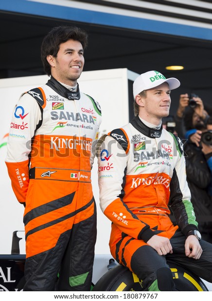 JEREZ, SPAIN - JANUARY 31: Sergio Perez & Nico\
Hulkenberg unveil there new Force India VJM07 F1 car on the first\
Test at the Jerez Circuit in Jerez, Andalucia, Spain on Jan. 31,\
2014.