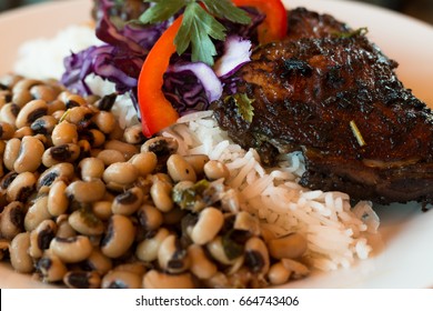 Jerk chicken with rice and black-eyed peas