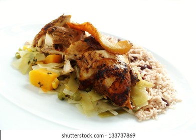 Jerk Chicken With Rice Peas And Steamed Cabbage