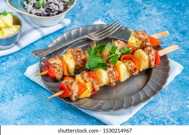 Jerk-style Chicken And Pineapple Skewers With Black Bean Rice