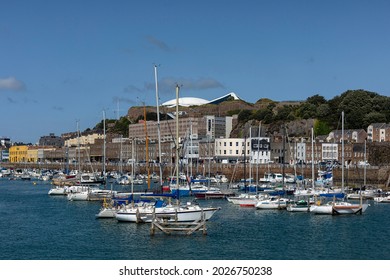 JERSEY, CHANNEL ISLANDS - AUGUST 06, 2021:  View of the Old Harbour and the boats in the marina