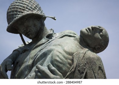 JERSEY CITY, NJ - MAY 26 2015: Close-up View Of The Liberation Monument, A Memorial To The Holocaust Depicting A US Soldier Carrying A Nazi Death Camp Survivor At Liberty State Park.