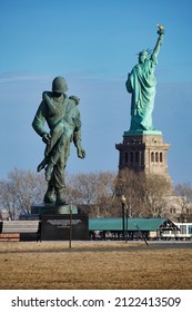 Jersey City, NJ, USA - February 12, 2022: Holocaust Memorial - Liberation With Statue Of Liberty In The Background.