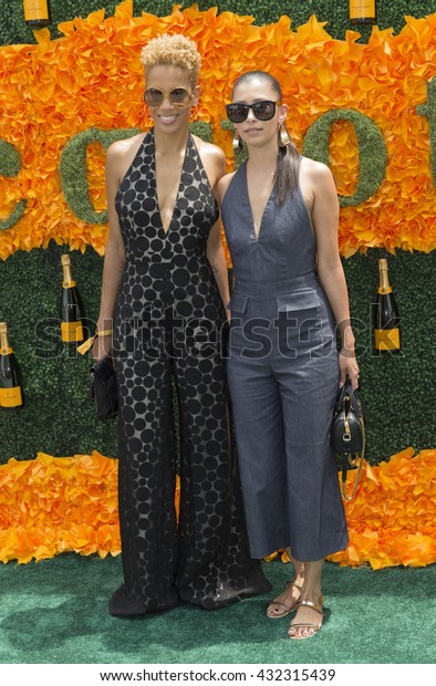 Jersey City, NJ USA - June 4, 2016: Michelle Ochs,\
Carly Cushie attends 9th annual Veuve Clicquot Polo Classic at\
Liberty State Park