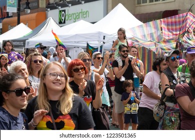 Jersey City, NJ/USA.  August 25, 2018:    A Diverse Crowd Of People Applaud The Speaker On The Main Stage During The 18th Annual Jersey City LGBT Pride Festival.