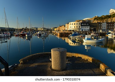 Jersey, U.K. August 4th 2020, Summer evening calm high tide at the 19th century English harbour of St Helier.