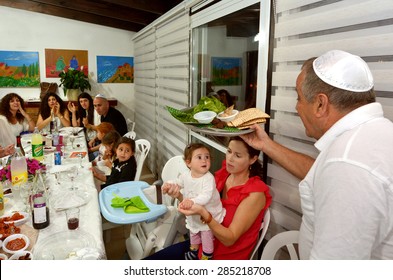 JERUSALEM - APR 04 2015:Jewish family celebrate Passover Seder.It's a Jewish ritual feast involving a retelling the story of  liberation of the Israelites from slavery in ancient Egypt 3500 years ago.
