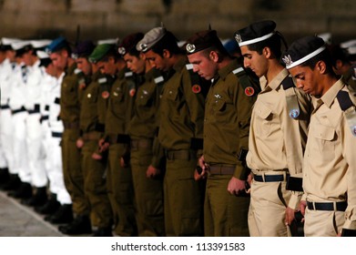 JERUSALEM - APRIL 22 2007:Group of Israeli soldiers stand in formation during a ceremony to mark the beginning of Memorial Day or Yom Hazikaron at the Kotel, western wall in Jerusalem old city Israel.
