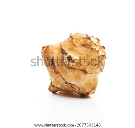 Jerusalem artichoke root isolated on a white background, close-up [[stock_photo]] © 