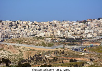 JERUSALEM, ISR - MAR 19 2015:The Israeli West Bank Barrier In East Jerusalem.It Protects Israel Civilians From Palestinian Political Violence Such As Terror Suicide Bombing Attacks.