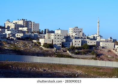 JERUSALEM, ISR - MAY 01 2015:The Israeli West Bank Barrier In East Jerusalem.It Protects Israel Civilians From Palestinian Political Violence Such As Terror Suicide Bombing Attacks.