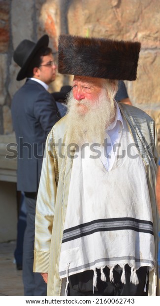 JERUSALEM ISRAEL 26 10 16: Jewish hasidic pray a\
the Western Wall, Wailing Wall the Place of Weeping is an ancient\
limestone wall in the Old City of Jerusalem. Second Jewish Temple\
by Herod the Great