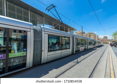 Jerusalem, Israel - April 10, 2019: Light rail or tramcar in a street of Jerusalem - the capital of Israel and major tourist sacred place in the Middle East and in all around of the world