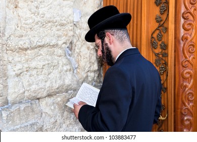JERUSALEM, ISRAEL - APRIL 26: Jewish praying at the western wall on a jewish holiday Israel's 64th Independence Day on April 26, 2012 in Jerusalem, Israel