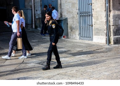 Jerusalem Israel May 20, 2018 View Of Unknown Israeli Police Officer Walking In The Street Of The Old City Of Jerusalem