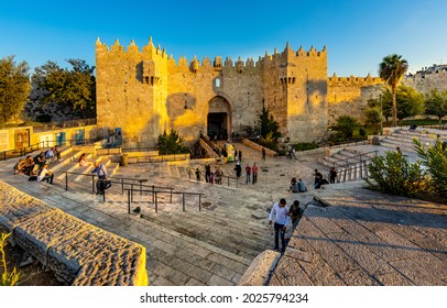 Jerusalem, Israel - October 13, 2017: Damascus Gate Of Ancient Old City Walls Leading To Bazaar Marketplace Of Muslim Quarter Of Jerusalem