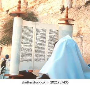 Jerusalem, Israel - Sep 26 2018: Lifting up the Torah scroll at the Western wall for Jewish holiday of Simchat Torah (Rejoicing with the Torah), following Sukkot (Feast of Tabernacles) 