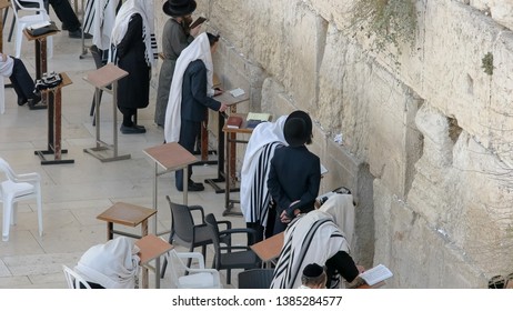 JERUSALEM, ISRAEL- SEPTEMBER, 21, 2016: High Angle Shot Of Jewish Men Praying And Worshiping At The Wailing Wall In Jerusalem, Israel