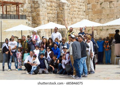 Jerusalem, Israel, Western Wall - 23 March 2015.  Happy Israeli Family After Bar Mitzvah Celebration  