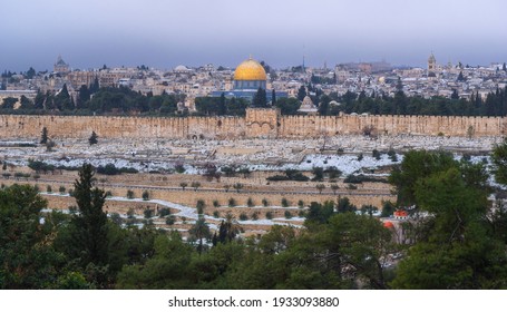 Jerusalem in the snow, beautiful view of the Temple mount, the Dome of the Rock and the Old City from the Mount of Olives after a February snowfall