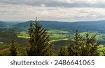 Jesenik town, Bela river valley and hills of Zlatohorska vrchovina mountains with Zlaty chlum hill from Tocnik hill in Jeseniky mountains in Czech republic