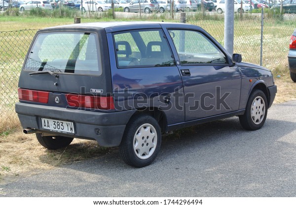 JESOLO, ITALY - JUNE 22, 2014: Autobianchi Y10 facelift\
designer city compact and economy 1990s car manufactured from 1985\
to 1995 marketed under the Lancia brand in most export markets as\
Lancia Y