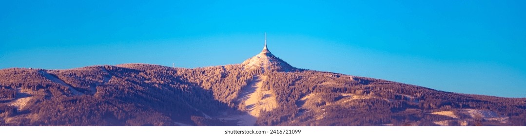 Jested Mountain with unique hotel and TV transmitter on the top on sunny winter day, Liberec, Czechia - Powered by Shutterstock