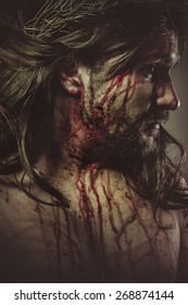 Jesus Christ With Crown Of Thorns And Blood On His Face