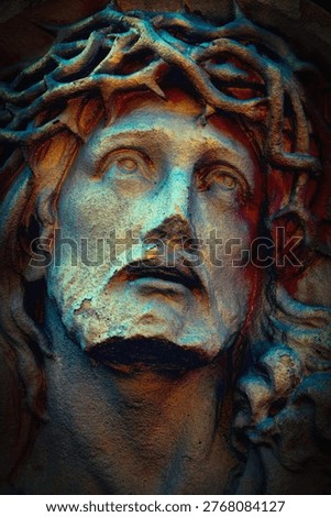 Jesus Christ with crown of thorns, dramatic artistic lighting, concept of suffering, sacrifice and redemption.