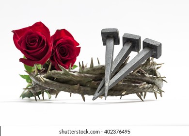 Jesus Christ crown of thorns, nails and two roses on a white background.