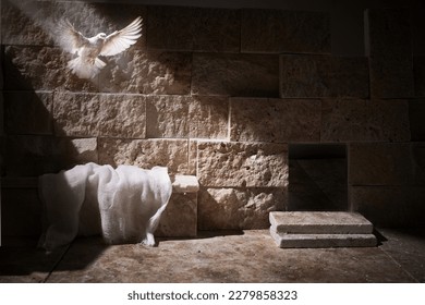 Jesus Christ crucifixion death and resurrection and easter dove flying in a stone tomb - Shutterstock ID 2279858323