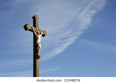 Jesus Christ Crucifixion Sculpture Against Blue Stock Photo 111948176 ...