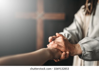 Jesus Christ gives a helping hand to the faithful