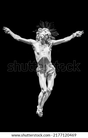 Jesus Christ - Old crucifix, Catholic Church, on black background with copy space