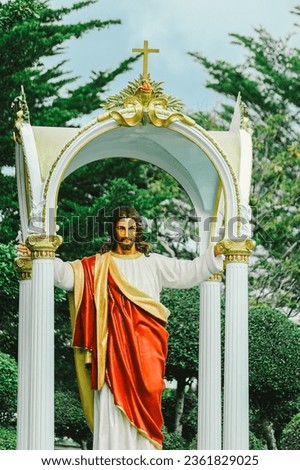 Jesus Christ statue at the entrance of the Catholic Church in Thailand. Stock photo © 