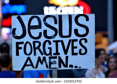 Jesus forgives amen sign at the times square in new york city